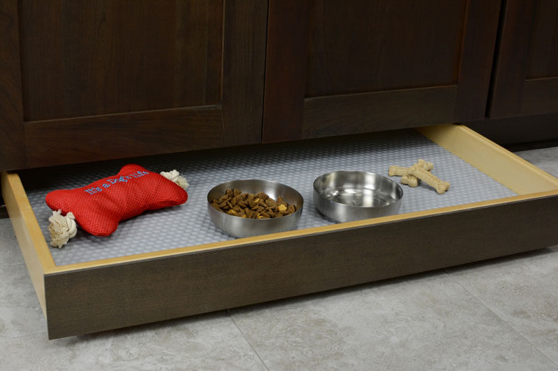 Kitchen Design Idea - Toe Kick Drawers // They are ideal for a pet food station.