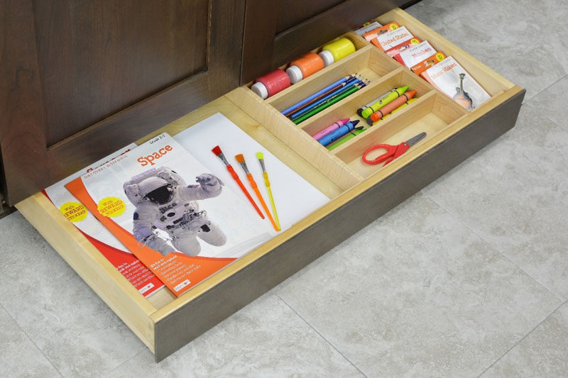 Kitchen Design Idea - Toe Kick Drawers // Perfect spot for childrens craft storage