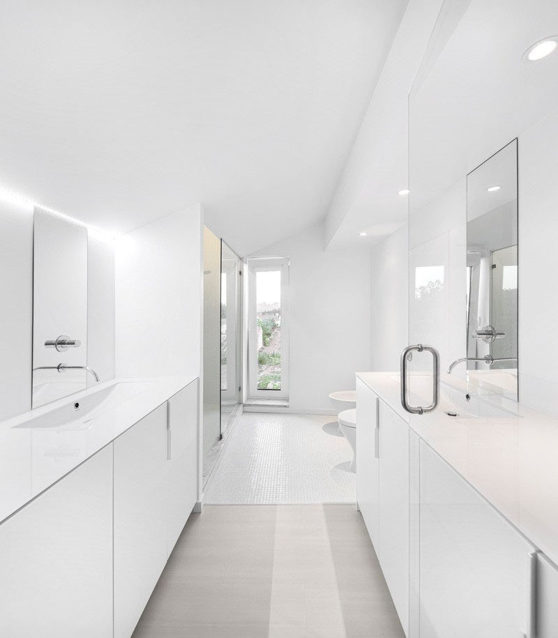 Bathroom Design Idea - Create a Spa-Like Bathroom At Home // Include crisp white walls.