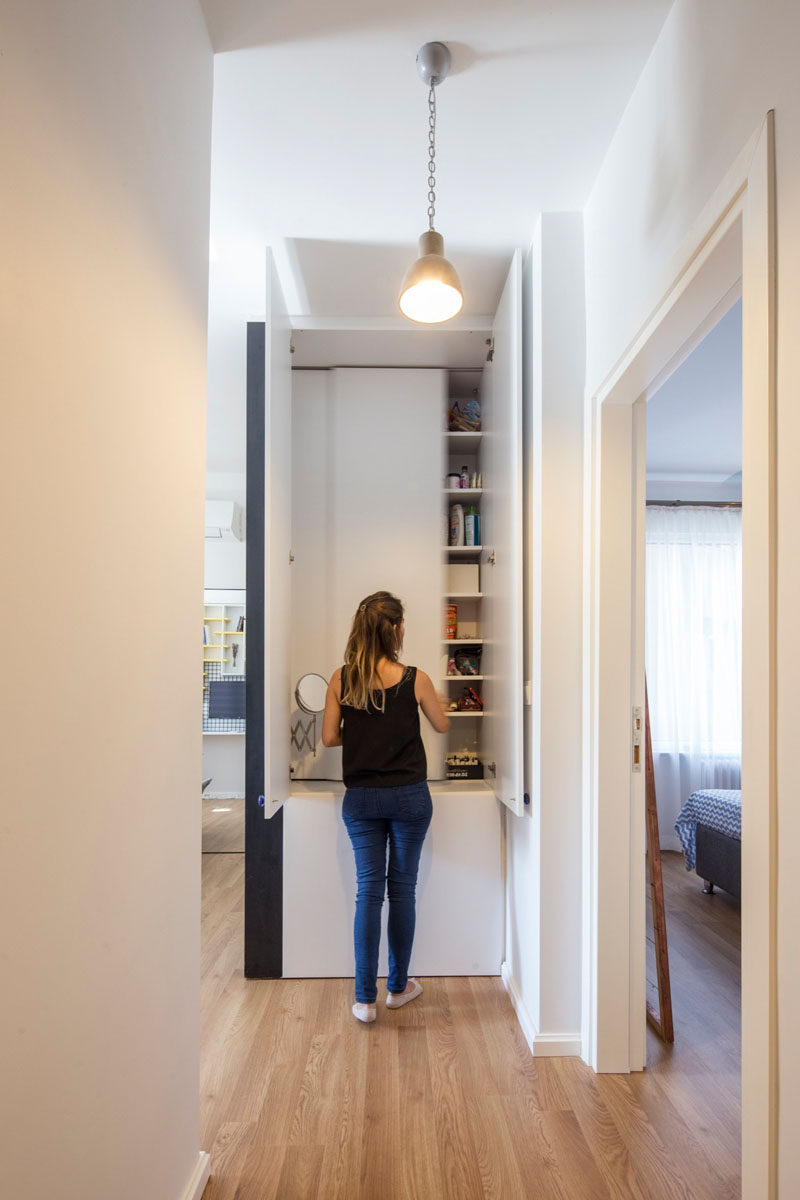 In this apartment, a closet at the end of the hallway creates much needed extra storage space.