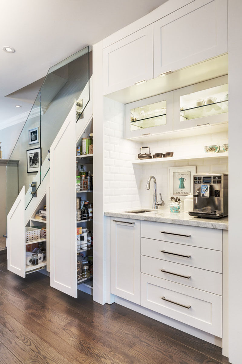This home added a coffee station and food storage cabinet under the stairs