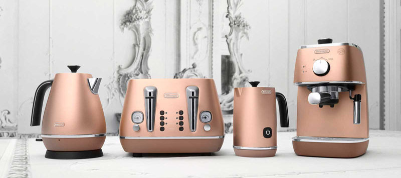 Kitchen Decor Ideas - 12 Ways To Add Copper To Your Kitchen // Make your breakfast in style with this entire copper series that includes two kinds of kettles, a toaster and an espresso machine.