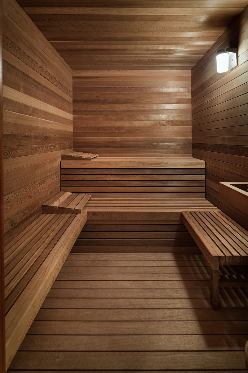 This wood covered sauna has been designed with different levels for sitting.