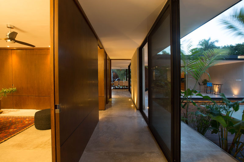 This hallway in a house in Mexico can be opened to the outdoors for an indoor/outdoor living experience.