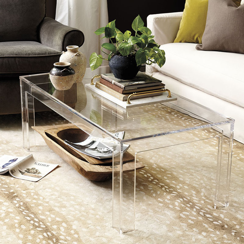 5 Ways To Use Acrylic Decor Throughout Your House // Living Room - An acrylic coffee table is one of the best things to include in an interior that's small or dark. It lets in as much light as possible and almost disappears into the rest of the decor to help the room feel bigger and more open than it actually is.