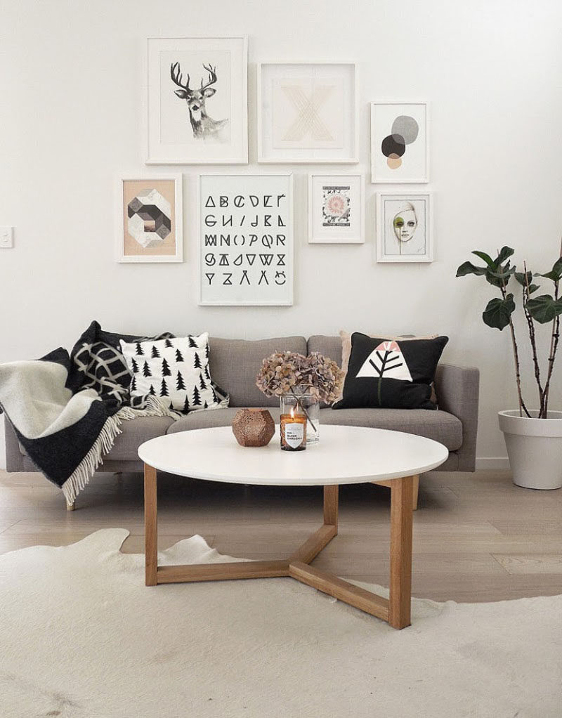 7 Ways To Create A Warm Living Room // Add a candle or two.