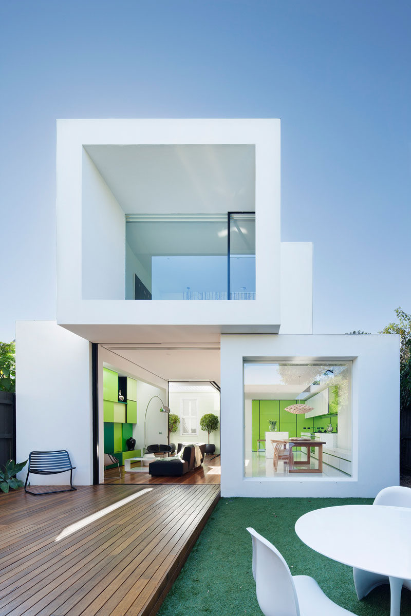 House Exterior Colors - 11 Modern White Houses From Around The World // This house looks like it's been made by stacking white blocks on top of each other to create a modern, open living space.