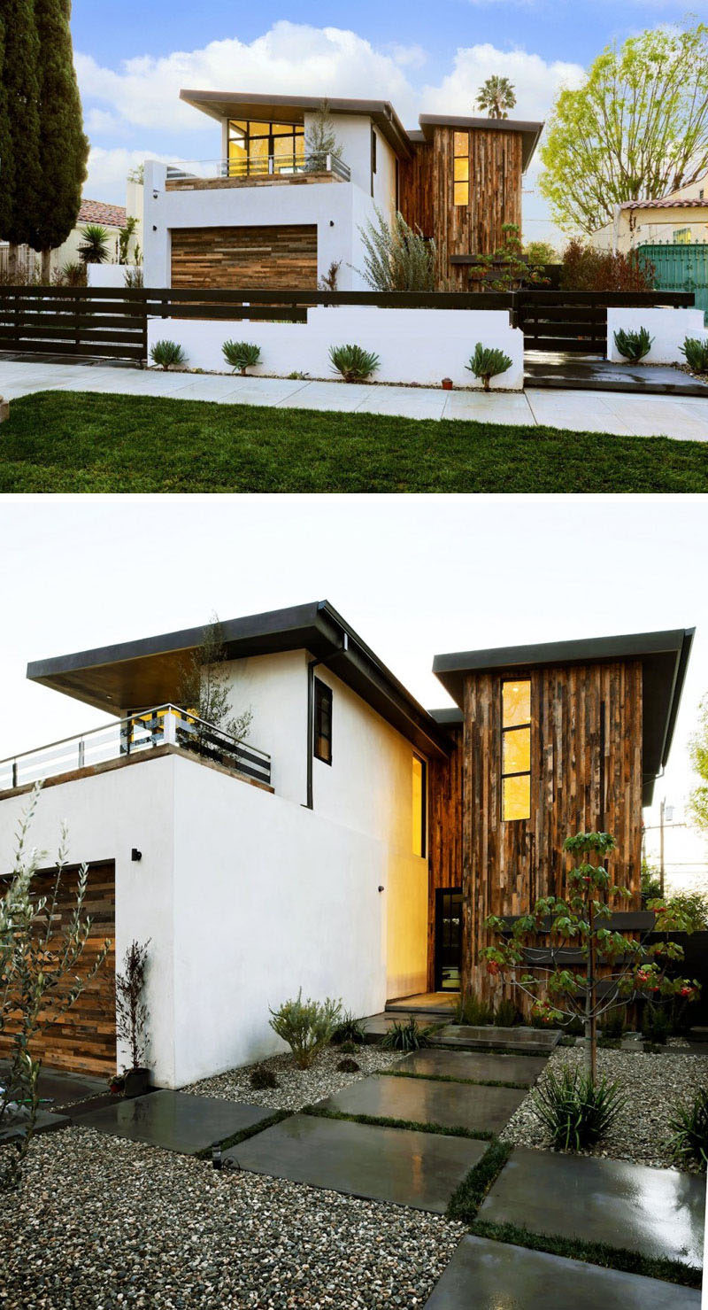 16 Examples Of Modern Houses With A Sloped Roof | The sloped roofs on this modern house, coupled with the wood paneling, gives the house a very modern look.