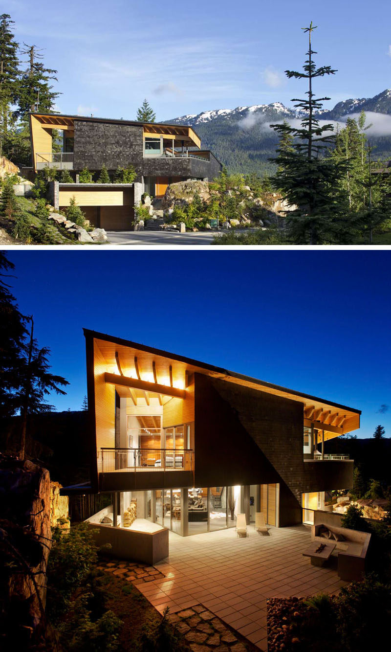 16 Examples Of Modern Houses With A Sloped Roof | The large sloped roof on this modern mountain home provides both a sense of openness as well as an element of privacy.