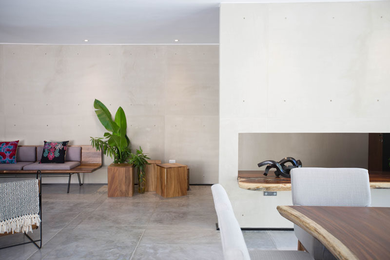 Concrete walls and floors are softened by the use of wood in this home in Mexico.