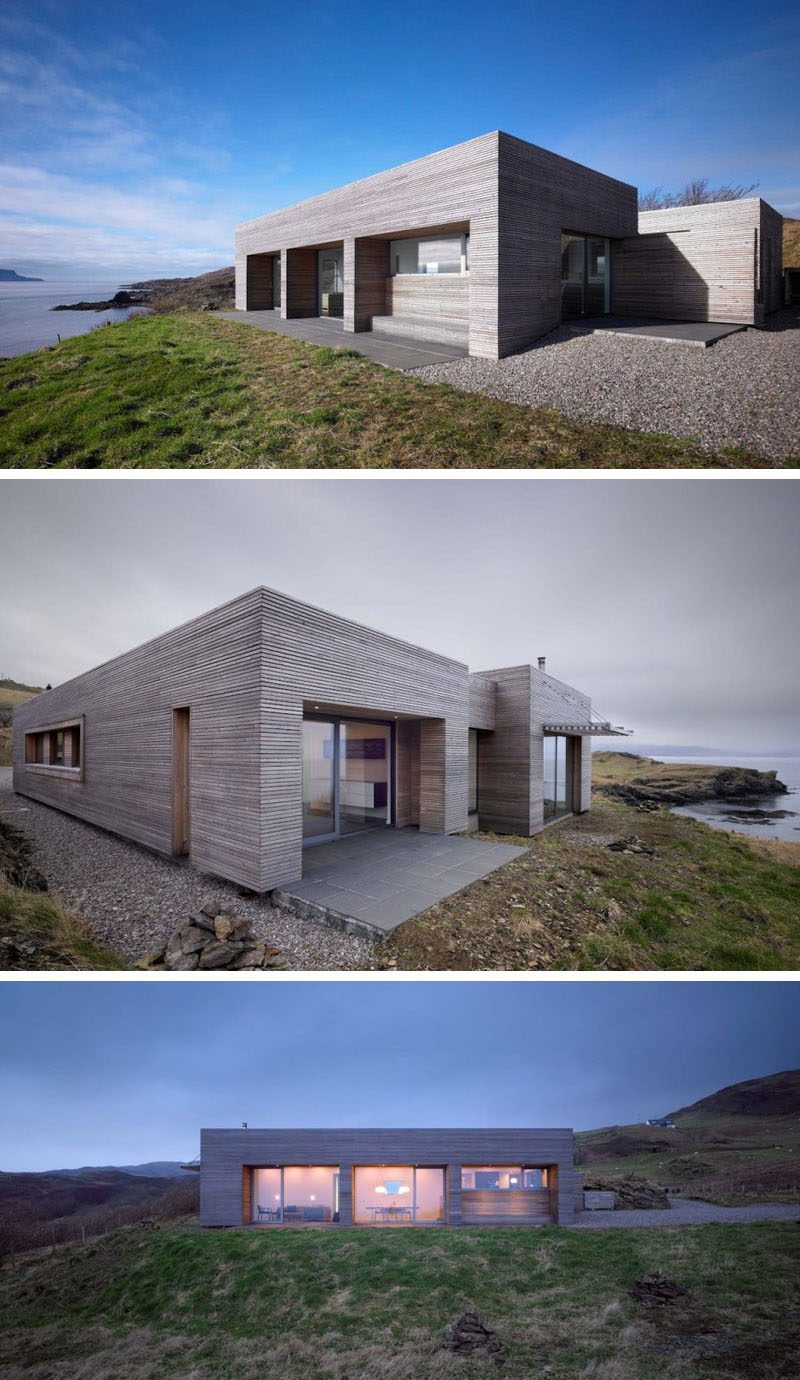 15 Single Story Modern Houses | This modest single story house overlooking the water is clad in light wood and has large windows to take advantage of the views of the landscape.