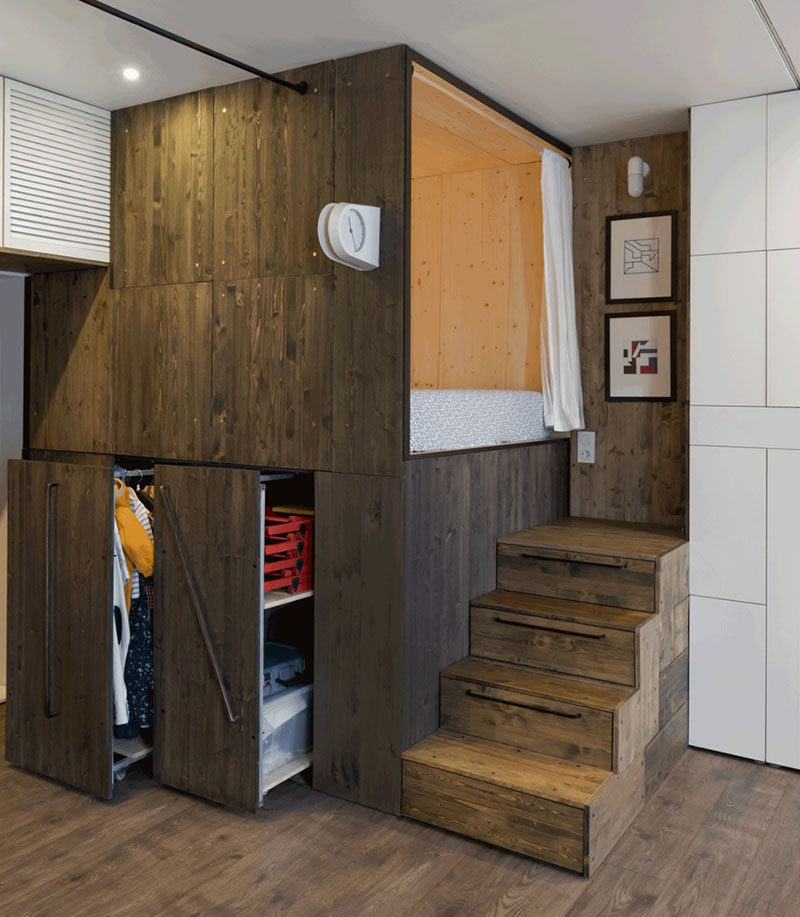 Small Apartment Design Idea - Raised bedroom allows for storage underneath