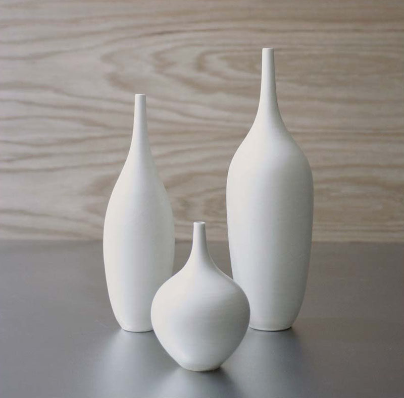 Home Decor Ideas - 6 Ways To Include Ceramic In Your Interior // These super simple minimalist white ceramic vases look great both on their own and as a set.