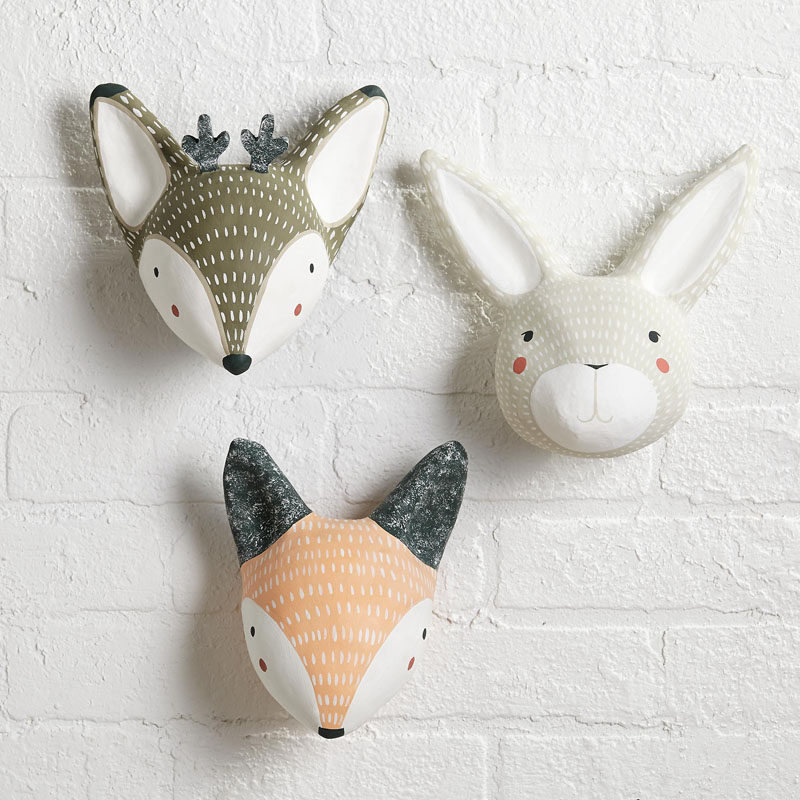 15 Decor Ideas For Creating A Woodland Nursery Design // These mounted animal heads add a whimsical touch to your walls and are neutral enough to match any color scheme.